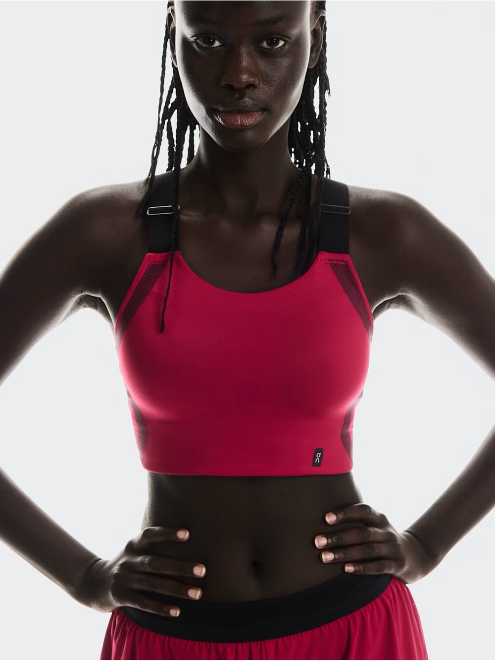On Running Women's High-Impact Sports Bra in Fuchsia with Black Straps